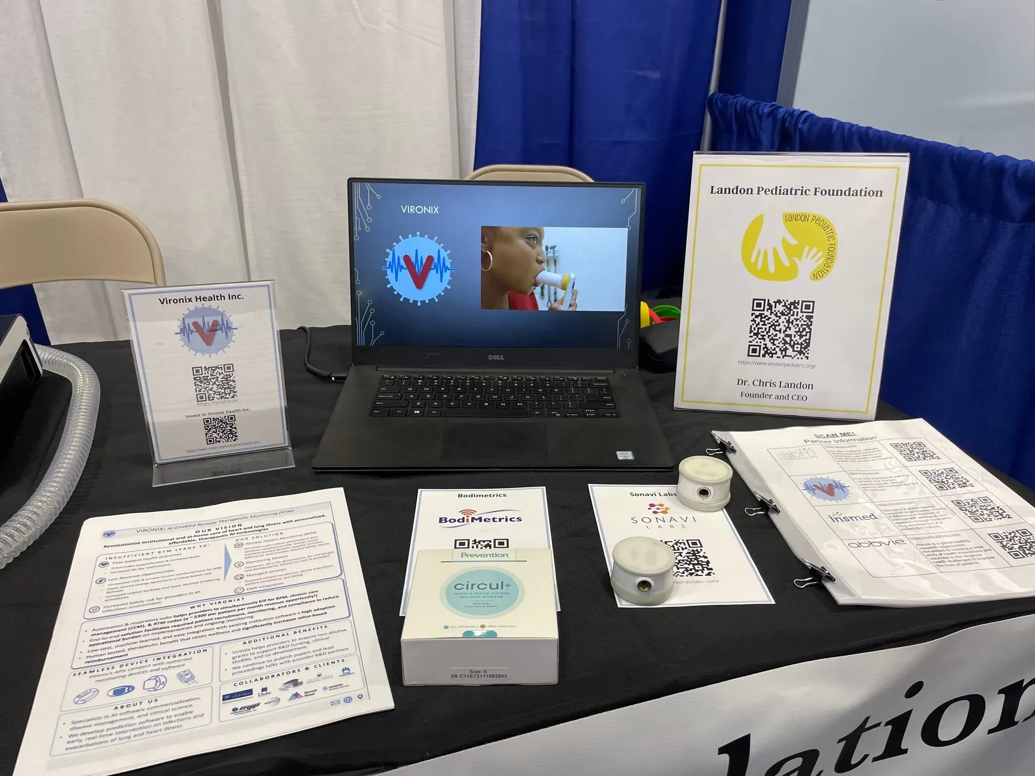 Vironix team members at American Thoracic Society conference booth